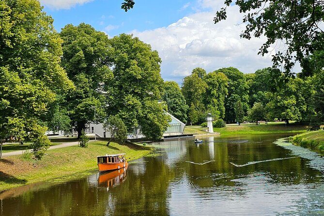 Riga Canal and Daugava Boat Tour with Welcome Drink & Audio Guide - The 50-minute canal cruise: why this timing works